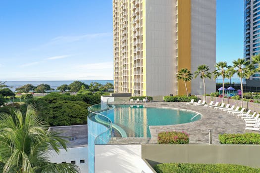 Luxury Coastal Hotels With Infinity Pools Facing Tropical Shores